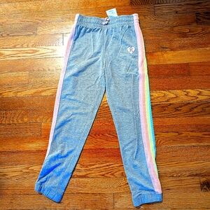 Multicolored striped jogging pants.